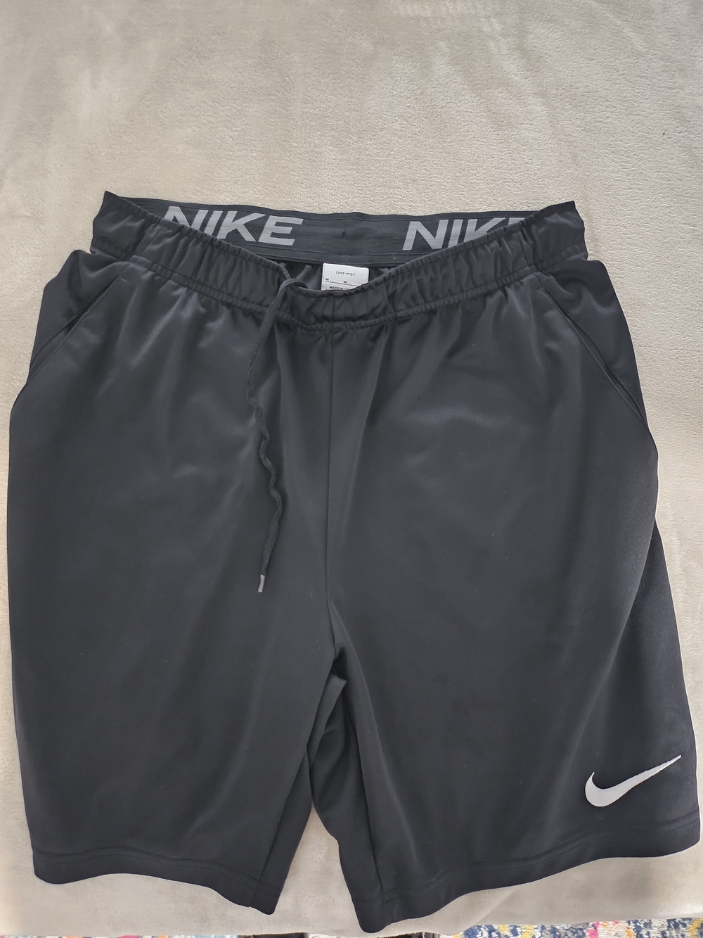 Nike Black Athletic Shorts with White Swoosh